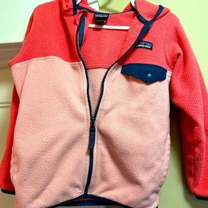 This is a spring/fall toddler size 4T fleece jacket. Brand by Patagonia. Durable
